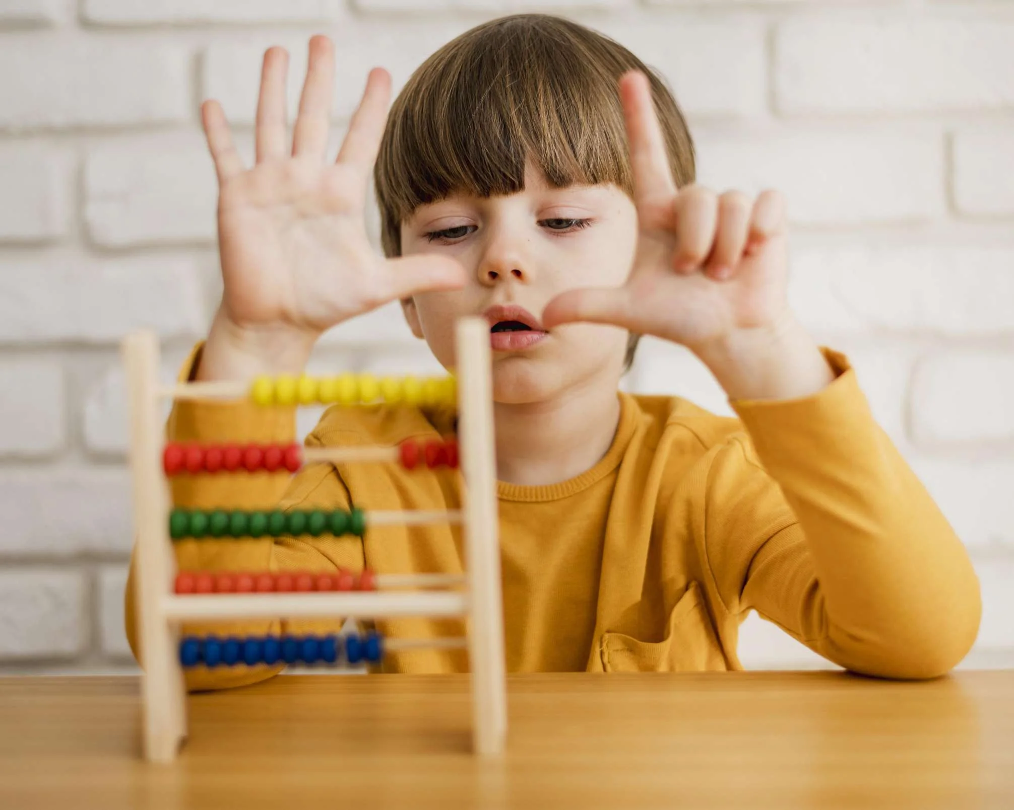 front-view-child-using-abacus-learn-how-count (1)